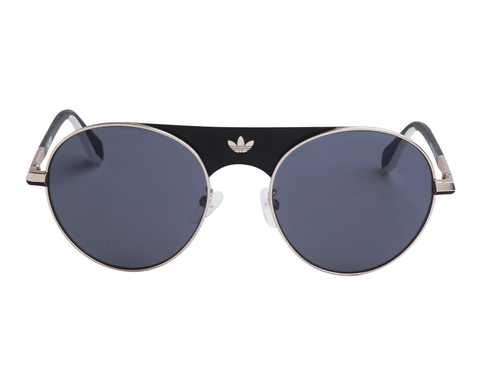 Adidas OR0092-S 32A 54-20 Oro Negro vista de frente