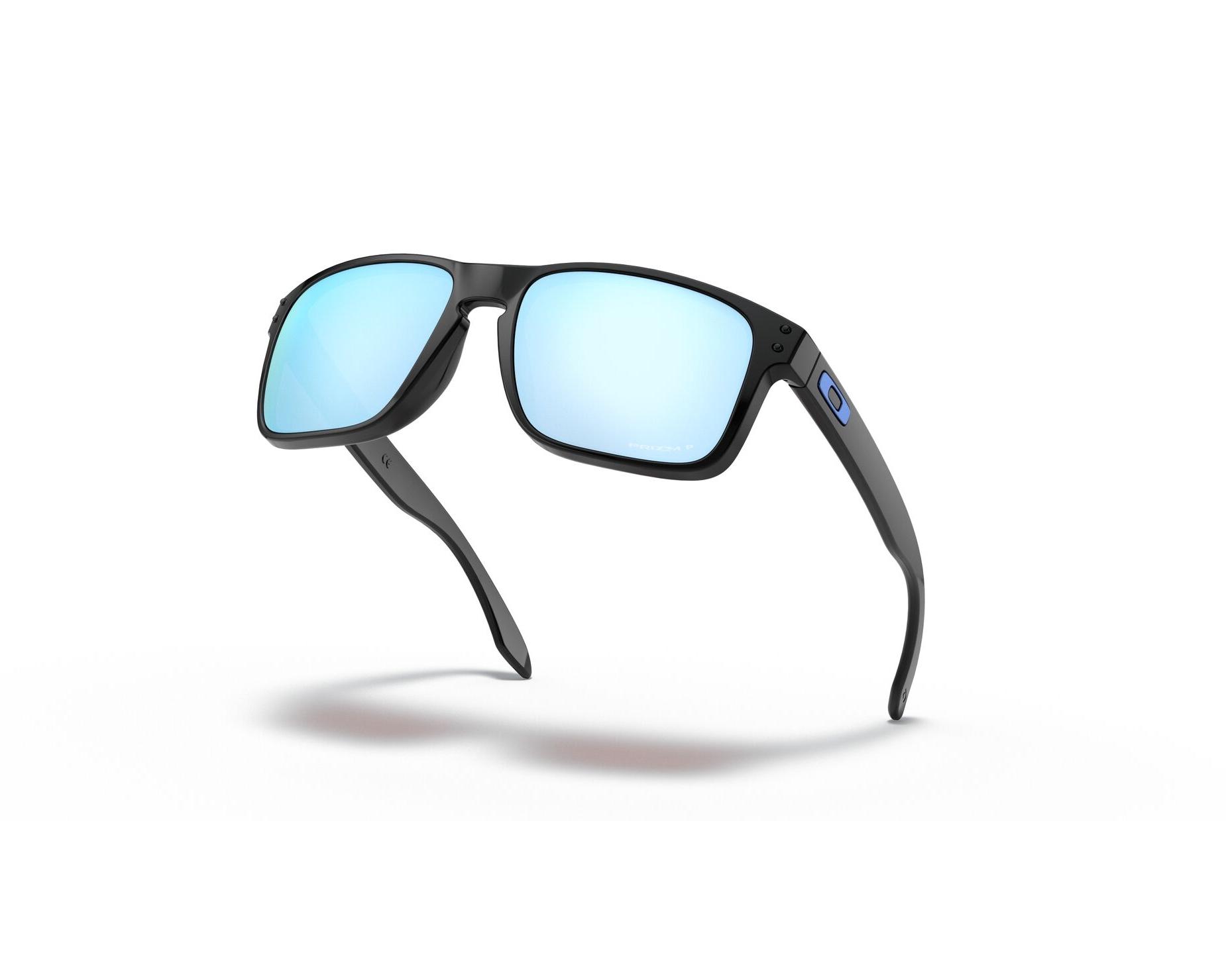 Oakley OO9102 9102C1 55-18 blau  Vista de 360 grados 1