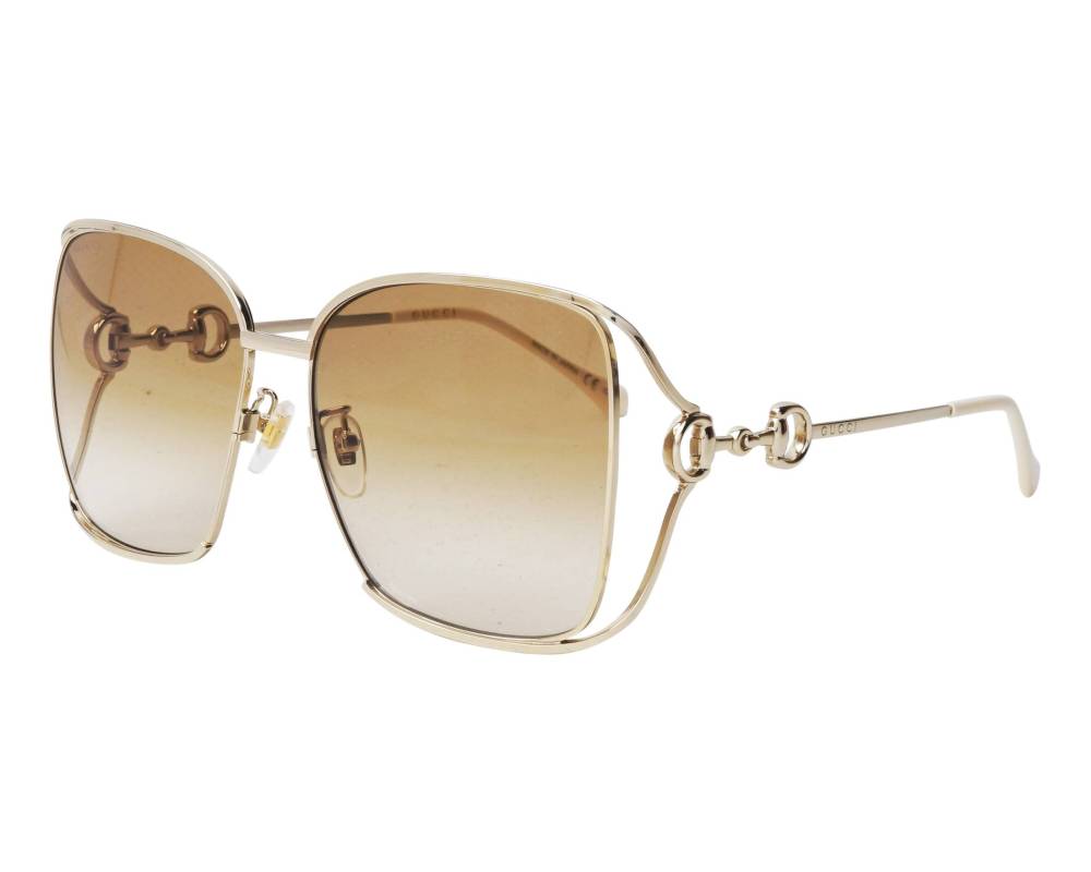 Gucci Gucci GG1020S 004 61-16 Or  vista de perfil